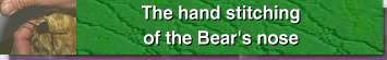 the hand stitching of the Bear's nose
